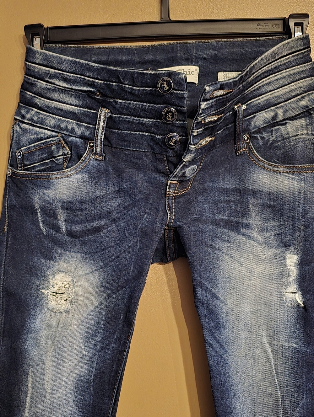 High-Rise Distressed Dark Blue Jeans with Multi-Button Waist